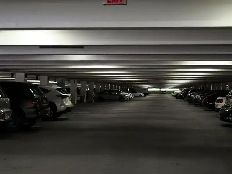 Car being towed from a parking garage in Dallas, TX